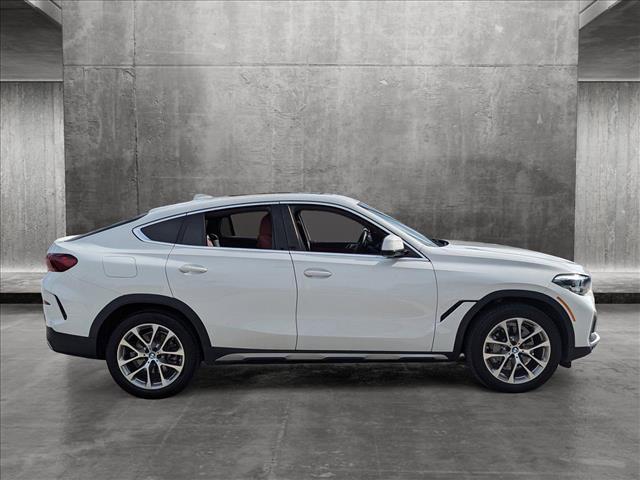 used 2022 BMW X6 car, priced at $62,007