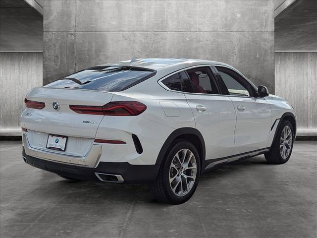 used 2022 BMW X6 car, priced at $62,007