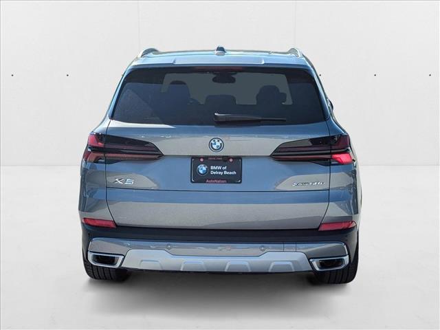 used 2025 BMW X5 PHEV car, priced at $76,660