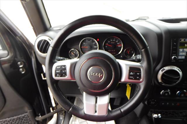 used 2016 Jeep Wrangler Unlimited car, priced at $24,992