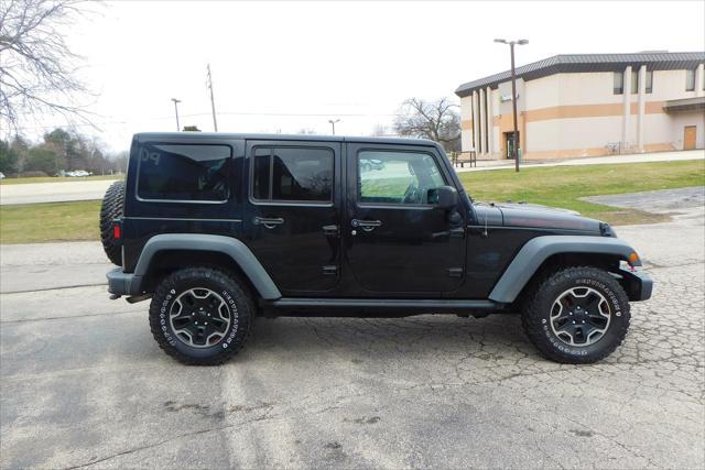 used 2016 Jeep Wrangler Unlimited car, priced at $24,992