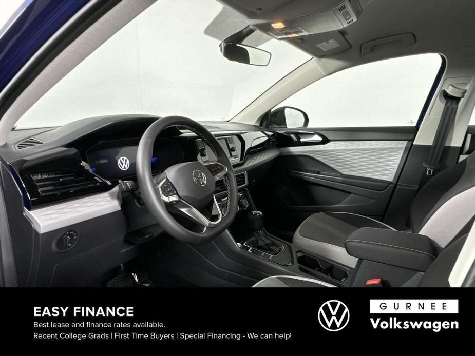 used 2023 Volkswagen Taos car, priced at $18,987