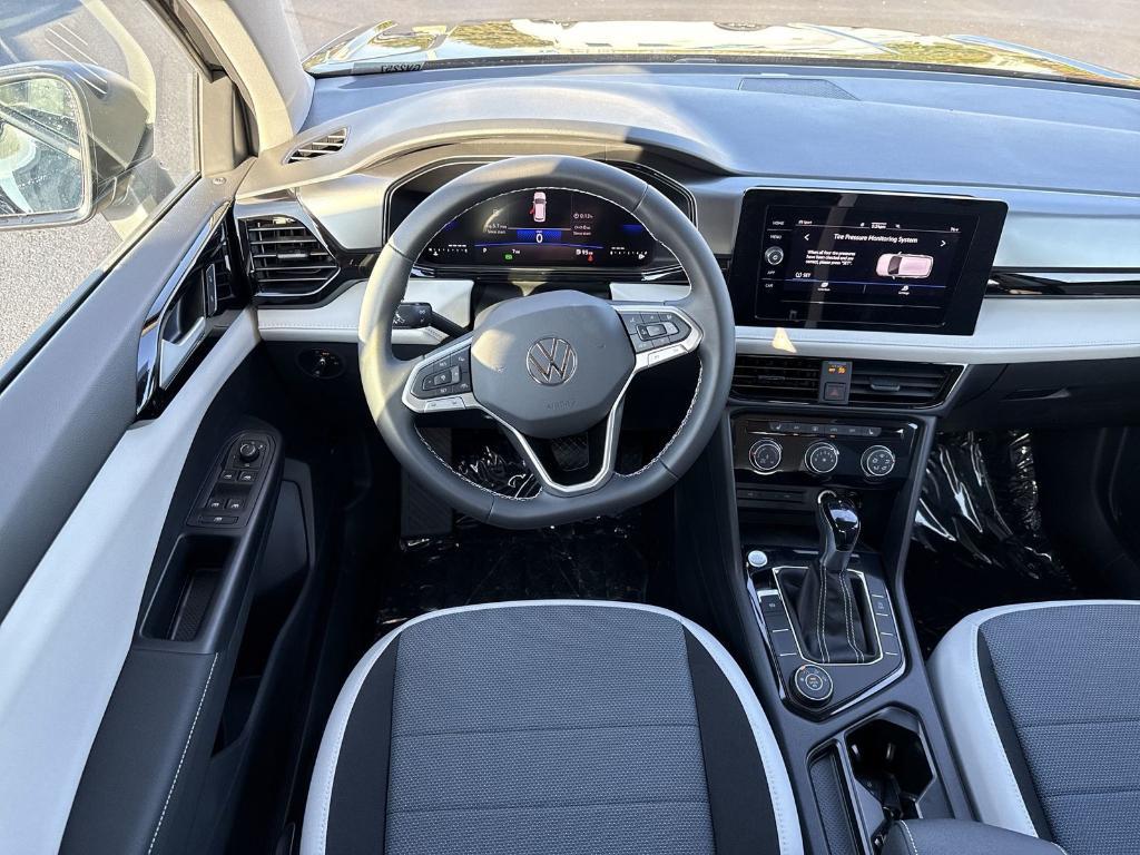new 2025 Volkswagen Taos car, priced at $28,170