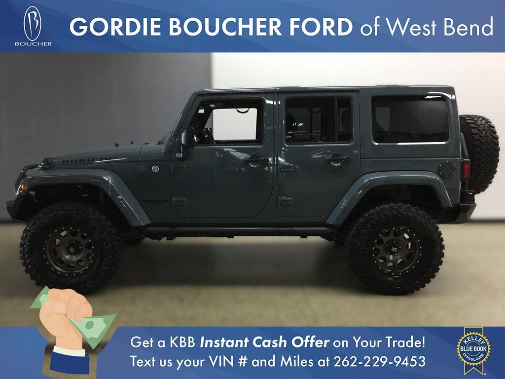 used 2015 Jeep Wrangler Unlimited car, priced at $23,495