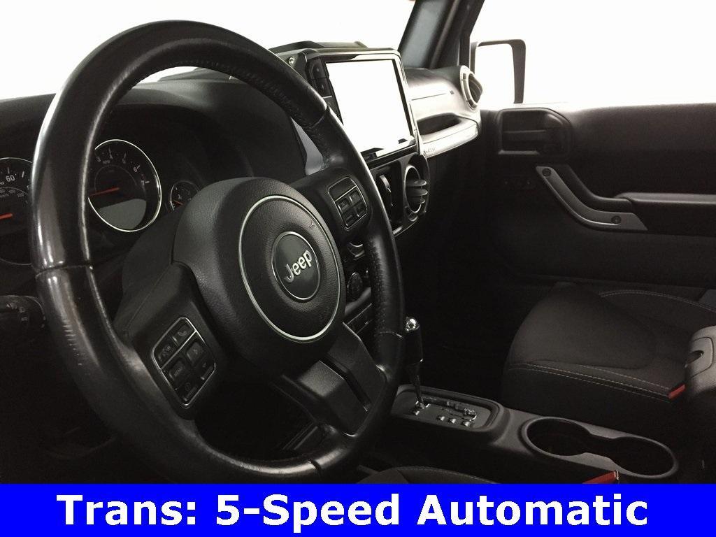 used 2015 Jeep Wrangler Unlimited car, priced at $23,495