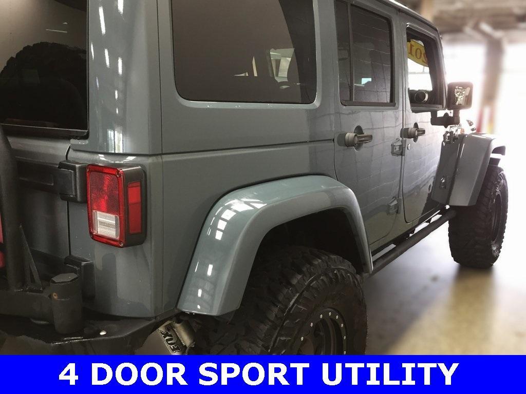 used 2015 Jeep Wrangler Unlimited car, priced at $23,495