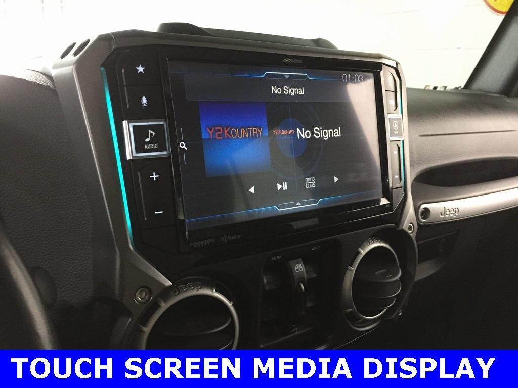 used 2015 Jeep Wrangler Unlimited car, priced at $23,495