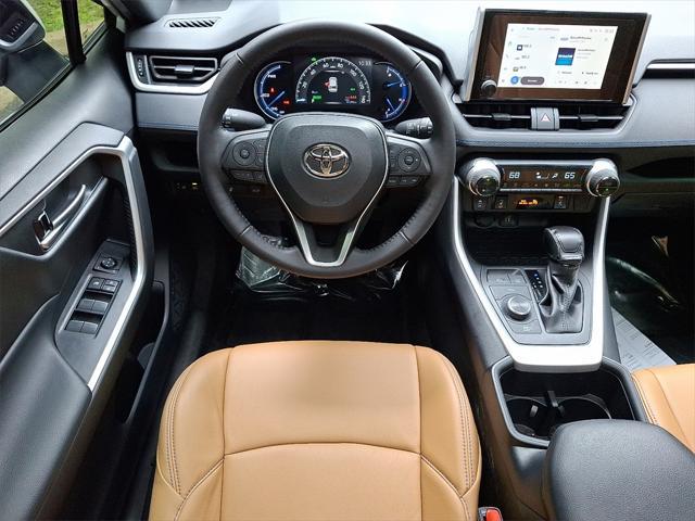 used 2023 Toyota RAV4 Hybrid car, priced at $32,681
