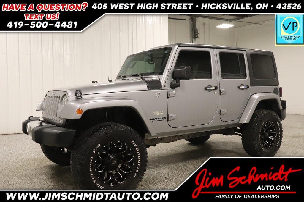 used 2015 Jeep Wrangler Unlimited car, priced at $19,591