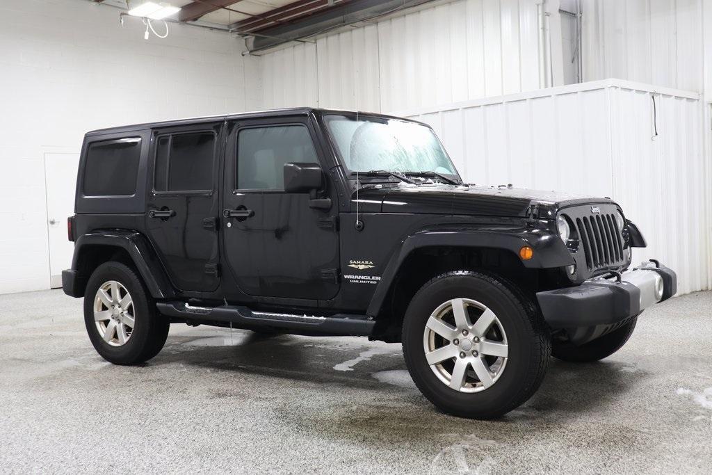 used 2015 Jeep Wrangler Unlimited car, priced at $14,690