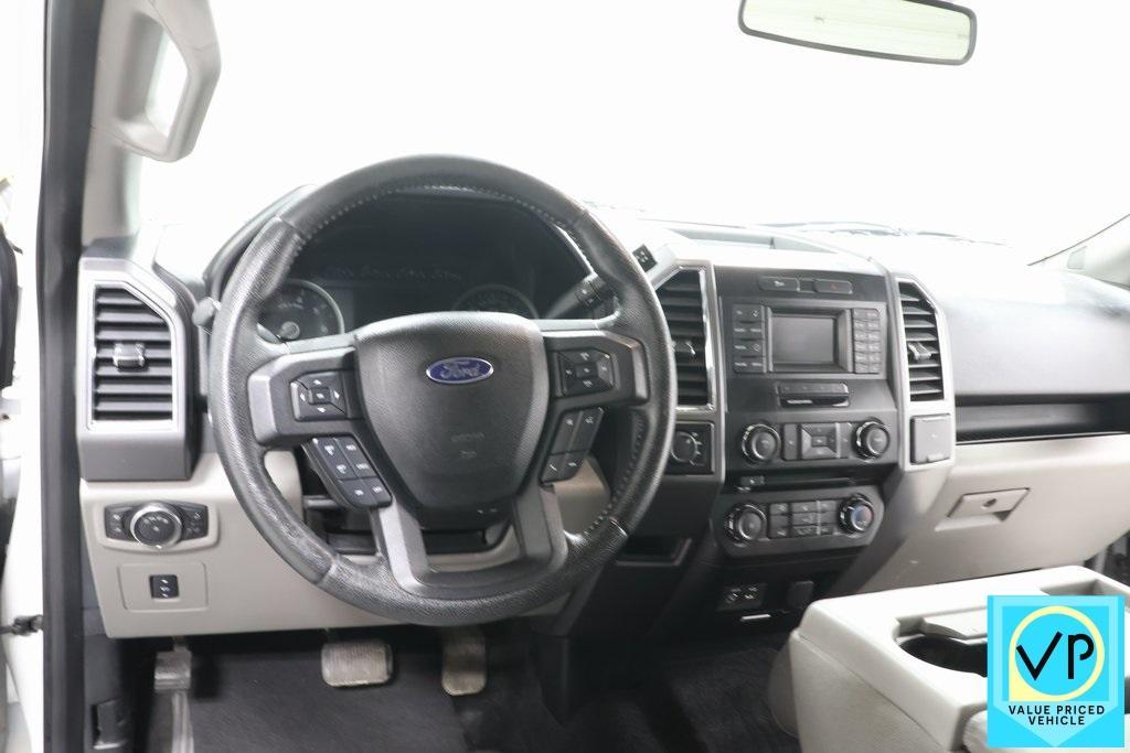 used 2015 Ford F-150 car, priced at $15,000