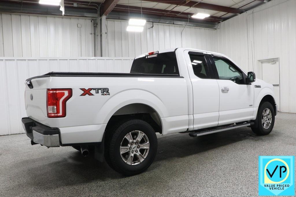 used 2015 Ford F-150 car, priced at $15,000