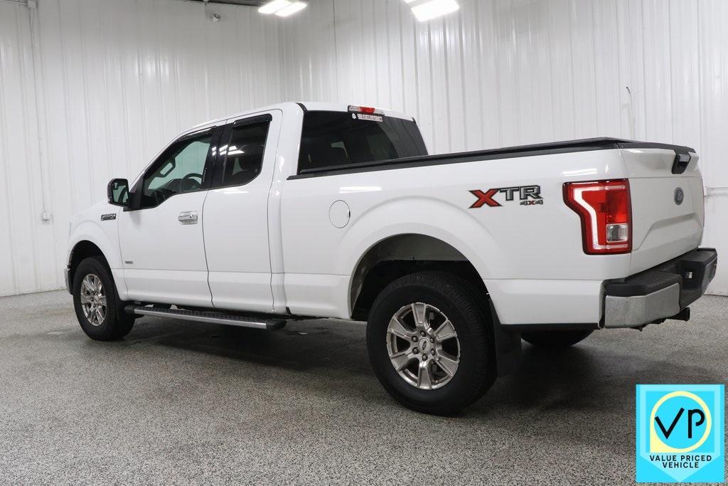 used 2015 Ford F-150 car, priced at $15,000