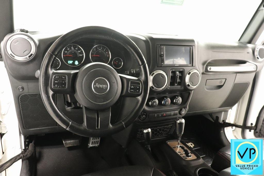 used 2015 Jeep Wrangler Unlimited car, priced at $16,841