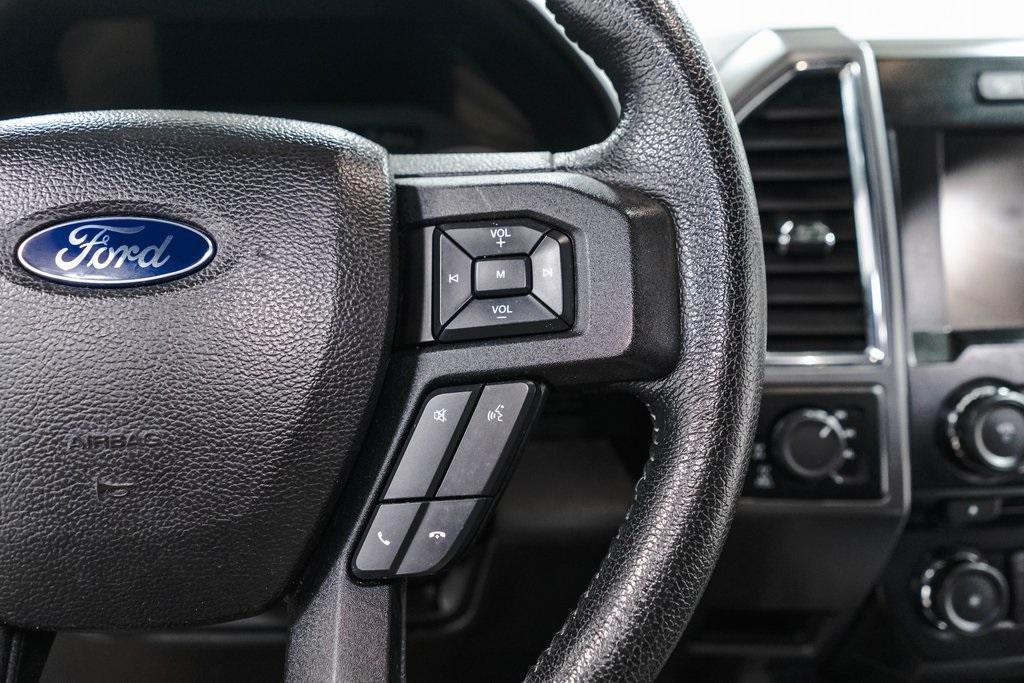 used 2015 Ford F-150 car, priced at $15,000