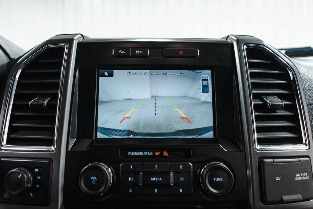 used 2015 Ford F-150 car, priced at $15,000