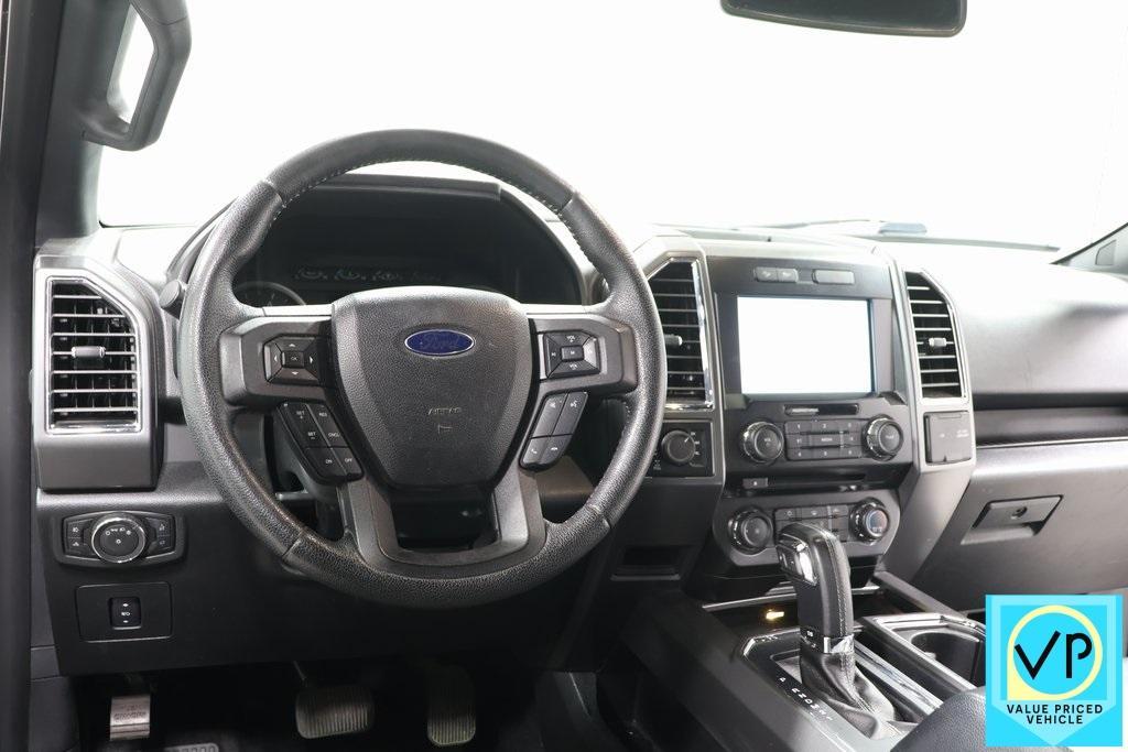 used 2015 Ford F-150 car, priced at $15,000