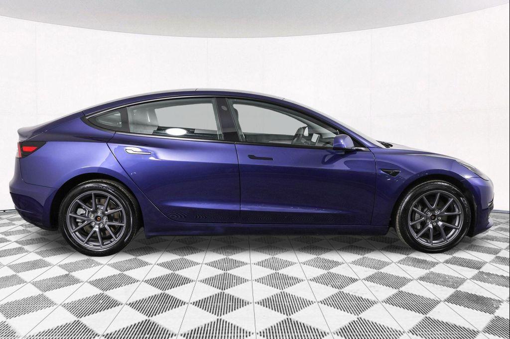 used 2023 Tesla Model 3 car, priced at $30,990