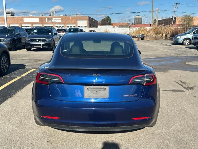 used 2023 Tesla Model 3 car, priced at $33,477