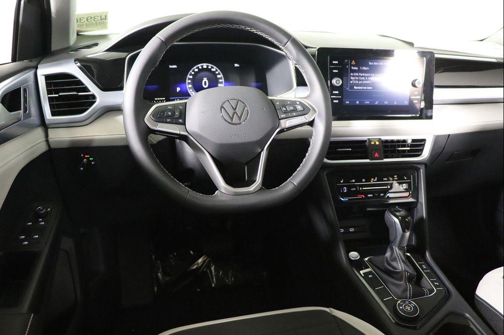 new 2025 Volkswagen Taos car, priced at $27,867