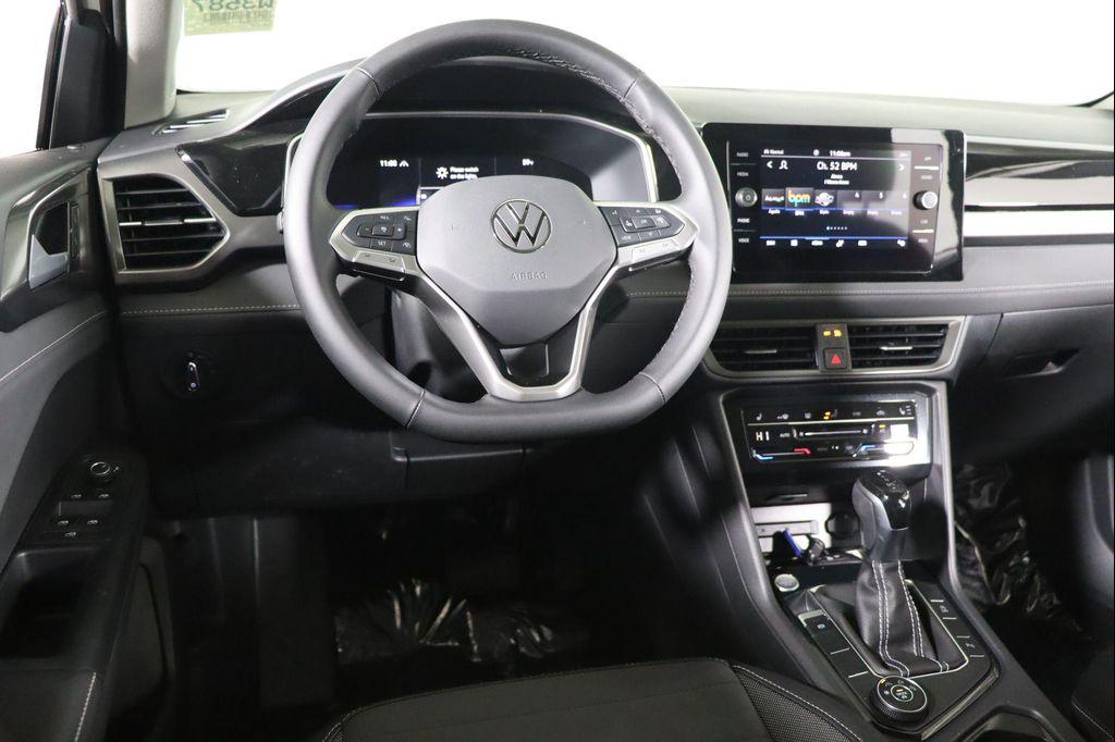 used 2025 Volkswagen Taos car, priced at $27,500