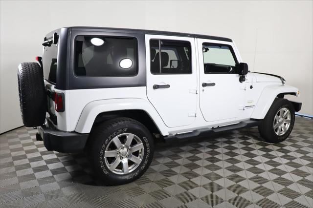 used 2013 Jeep Wrangler Unlimited car, priced at $16,490