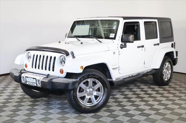 used 2013 Jeep Wrangler Unlimited car, priced at $16,490