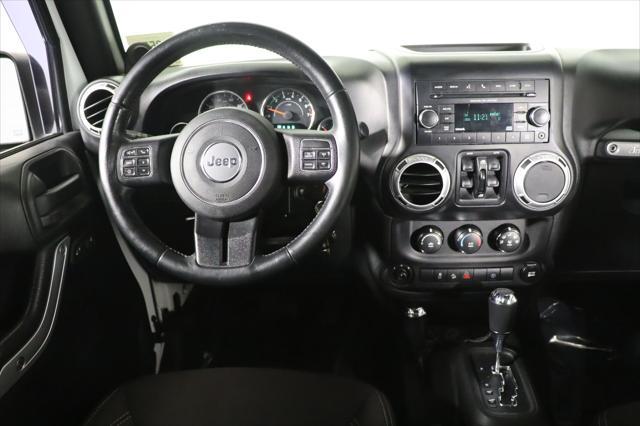 used 2013 Jeep Wrangler Unlimited car, priced at $16,490