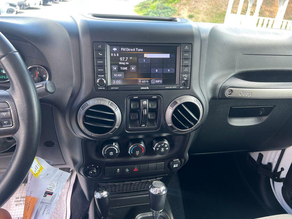 used 2018 Jeep Wrangler JK Unlimited car, priced at $24,987
