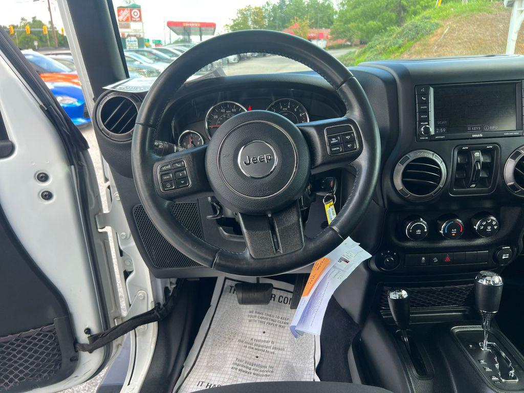 used 2018 Jeep Wrangler JK Unlimited car, priced at $24,987