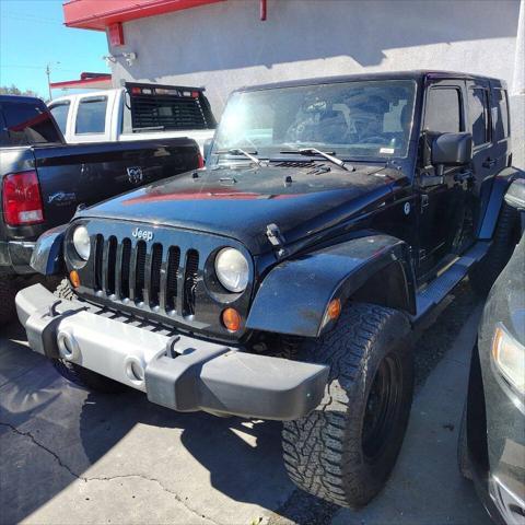 used 2012 Jeep Wrangler Unlimited car, priced at $15,950