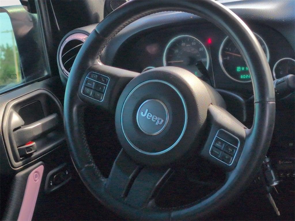 used 2014 Jeep Wrangler Unlimited car, priced at $19,910