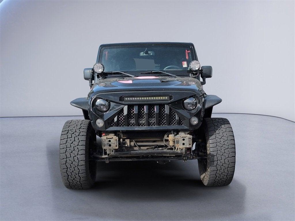 used 2014 Jeep Wrangler Unlimited car, priced at $19,910