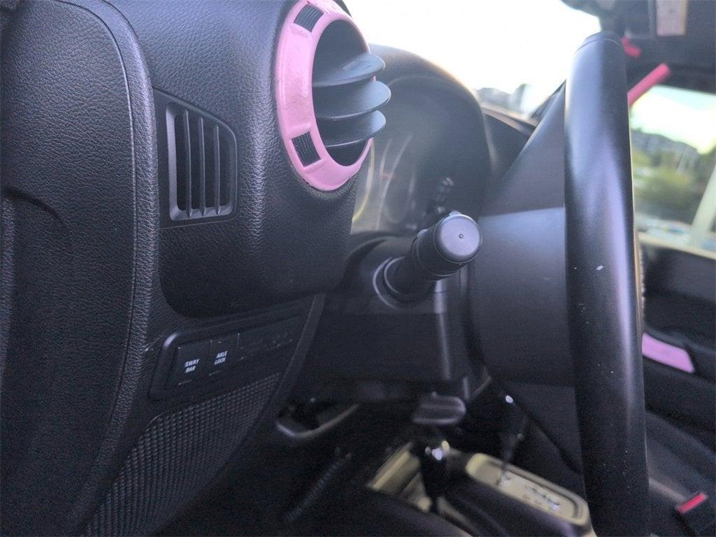 used 2014 Jeep Wrangler Unlimited car, priced at $19,910
