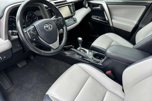 used 2018 Toyota RAV4 Hybrid car, priced at $29,000