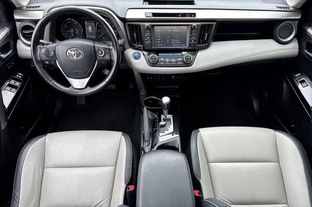 used 2018 Toyota RAV4 Hybrid car, priced at $29,000