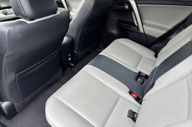 used 2018 Toyota RAV4 Hybrid car, priced at $29,000