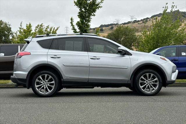 used 2018 Toyota RAV4 Hybrid car, priced at $29,000