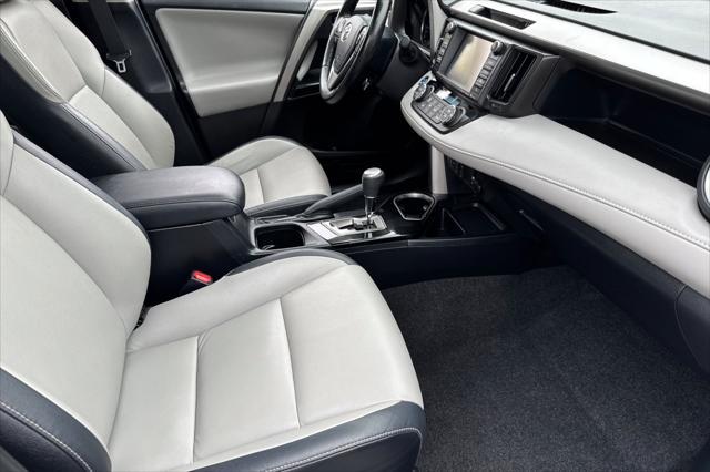 used 2018 Toyota RAV4 Hybrid car, priced at $29,000