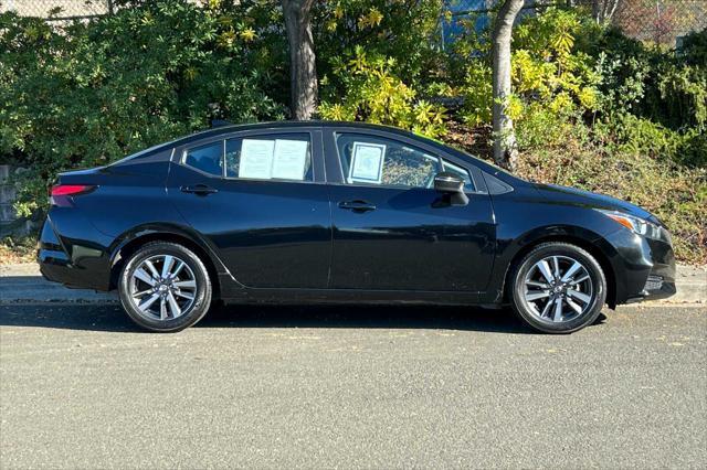 used 2021 Nissan Versa car, priced at $15,000