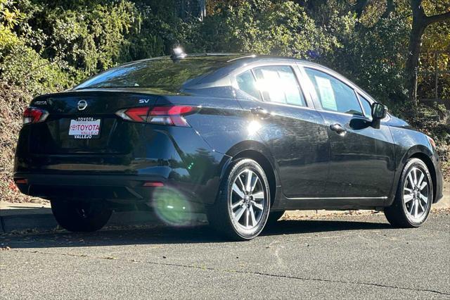 used 2021 Nissan Versa car, priced at $15,000