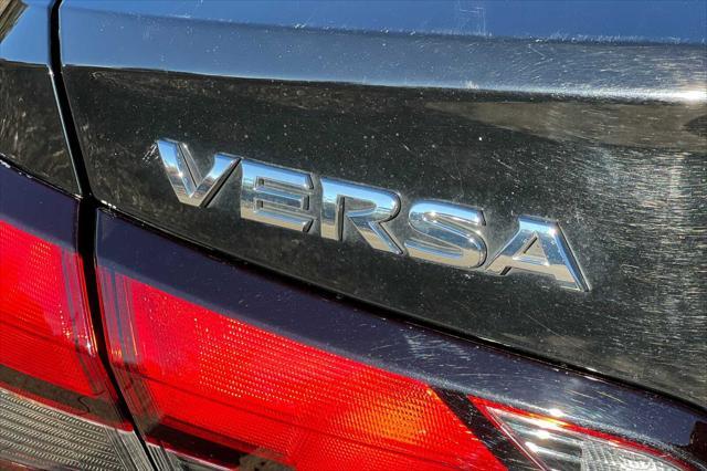 used 2021 Nissan Versa car, priced at $15,000