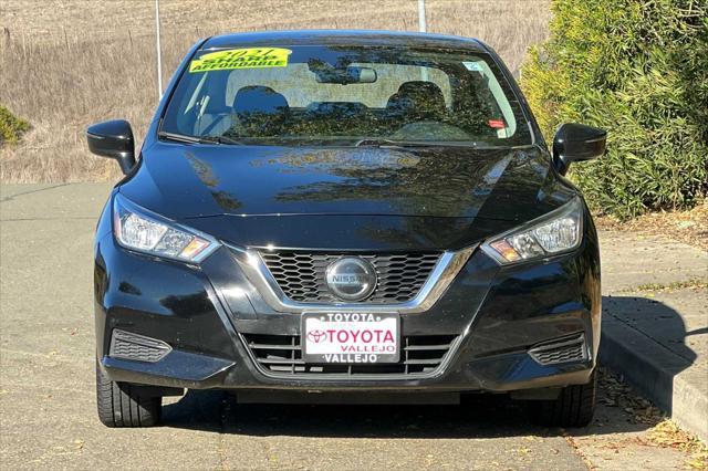 used 2021 Nissan Versa car, priced at $15,000