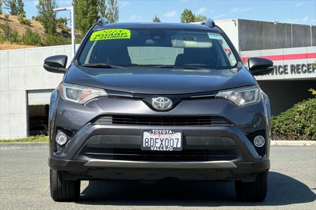 used 2018 Toyota RAV4 car, priced at $13,000