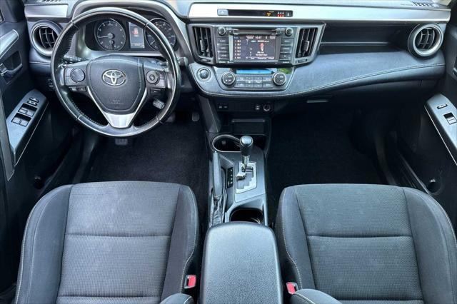 used 2018 Toyota RAV4 car, priced at $13,000