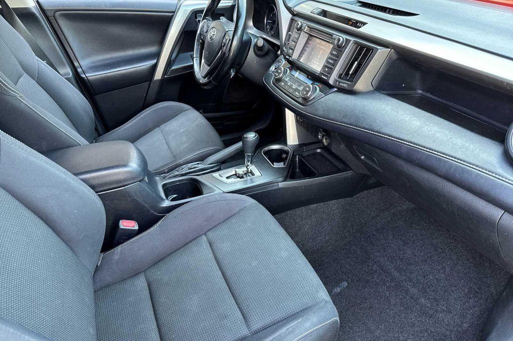 used 2018 Toyota RAV4 car, priced at $12,000