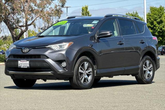 used 2018 Toyota RAV4 car, priced at $13,000