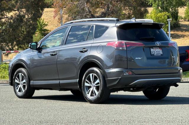 used 2018 Toyota RAV4 car, priced at $13,000