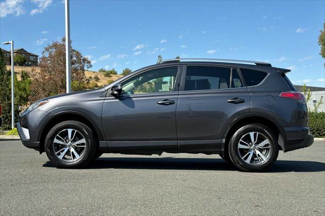 used 2018 Toyota RAV4 car, priced at $13,000