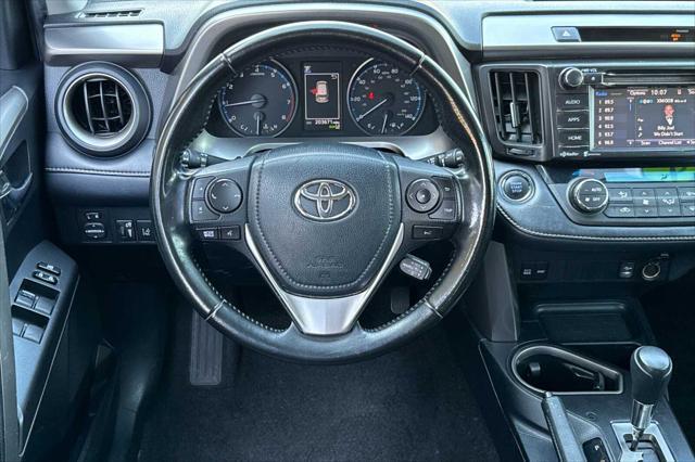 used 2018 Toyota RAV4 car, priced at $13,000